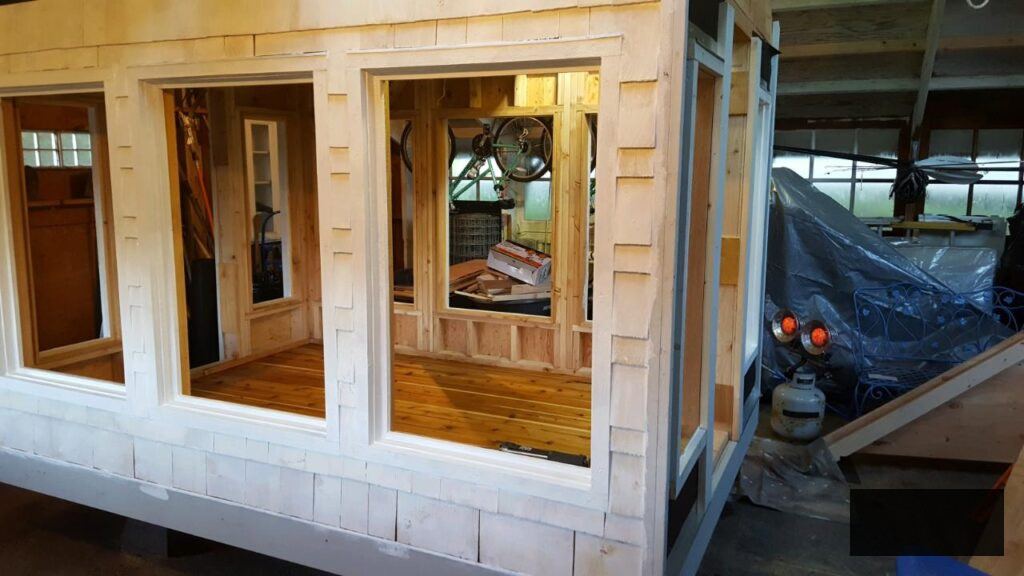 constructing the greenhouse in the garage