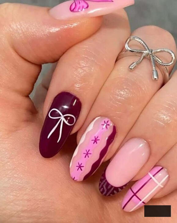 burgundy and rose christmas nail artwork with white gown and plaid motif