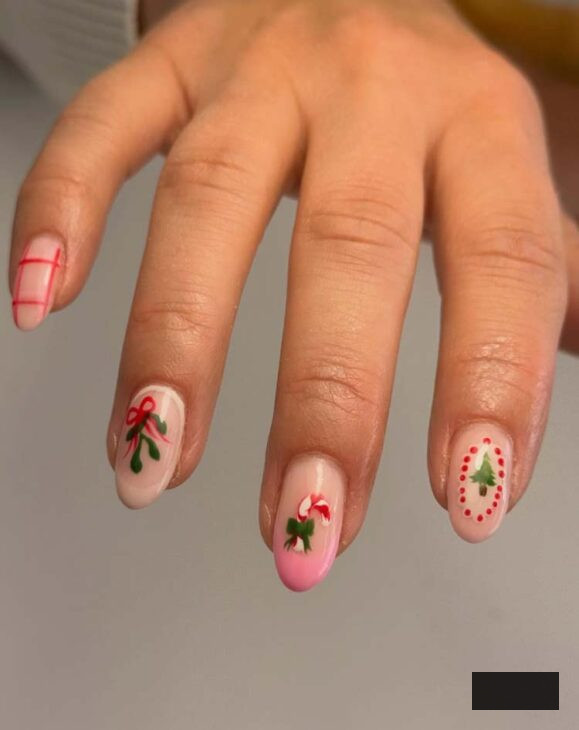 charming christmas nails featuring pink, beige, and holly berry and candy cane hand-drawn sketches