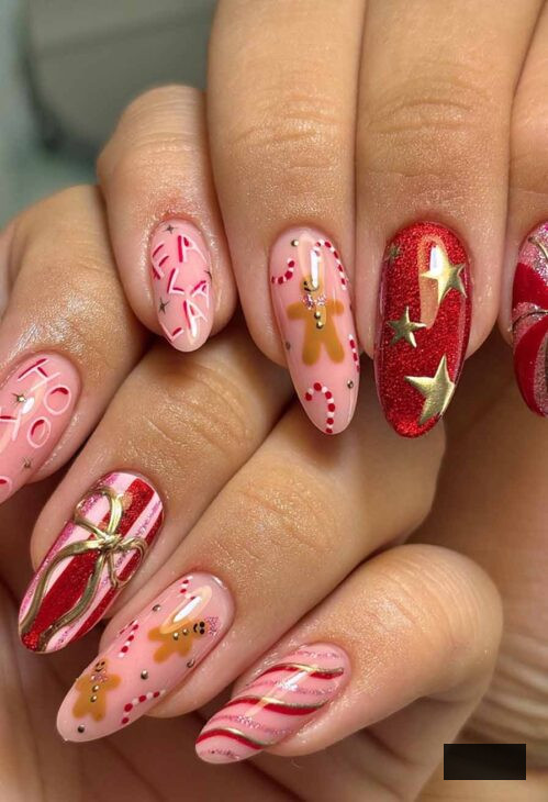 artistic crimson and gold christmas nails with pink