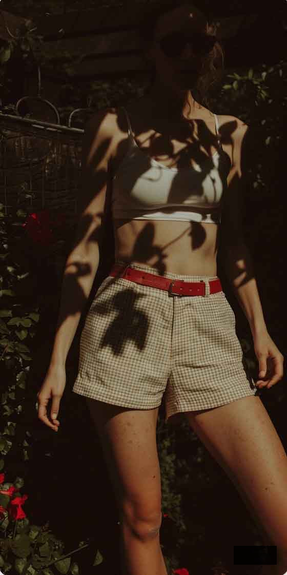 cute and comfy casual summer light academia outfit with plaid beige shorts