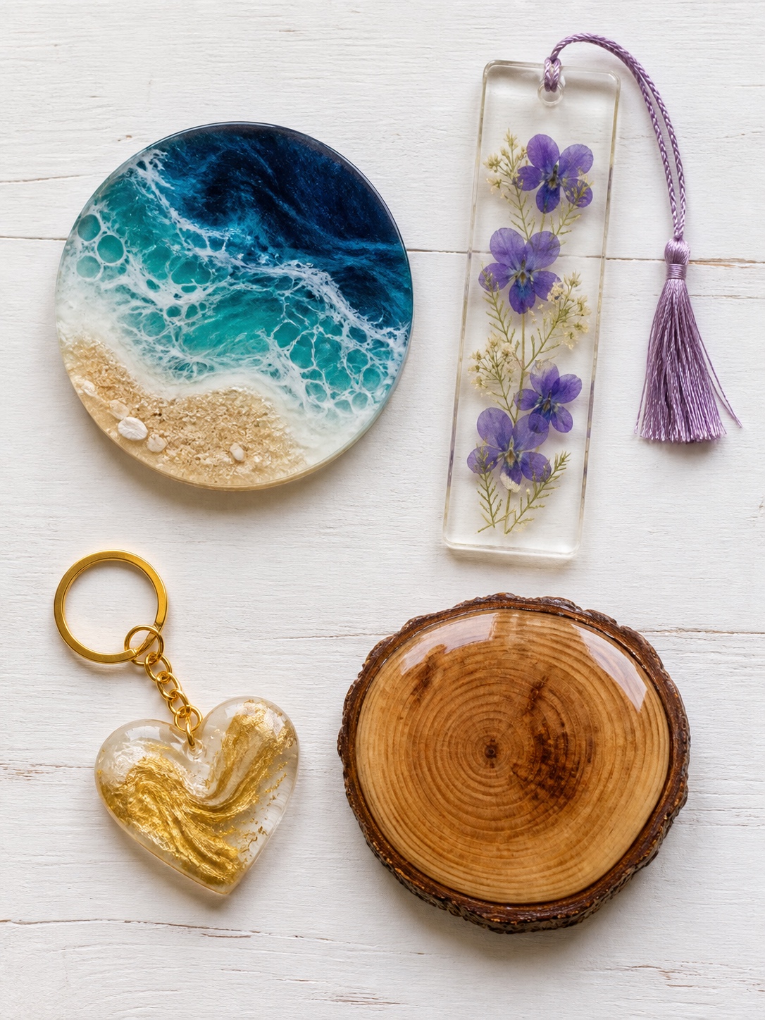 Beginner resin art projects Beginner resin art endeavors including a coaster, bookmark, keychain, and polished wood slice. | Sky Rye Design Beginner resin art endeavors including a coaster, bookmark, keychain, and polished wood slice.