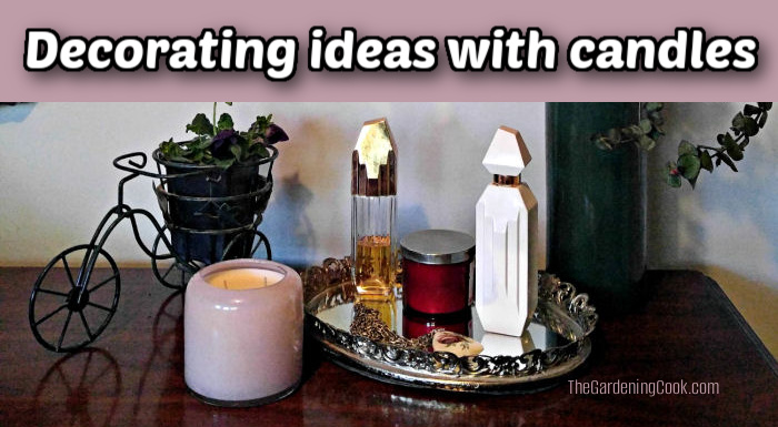 Velas e perfume em uma cômoda em um quarto. Caixa de texto rosa diz ideias de decoração com velas.