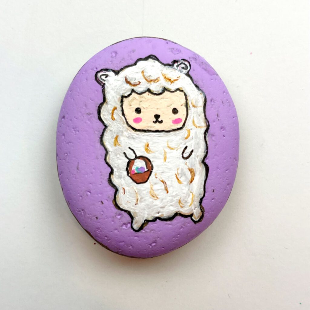 Pedra pintada de cordeiro para a Páscoa