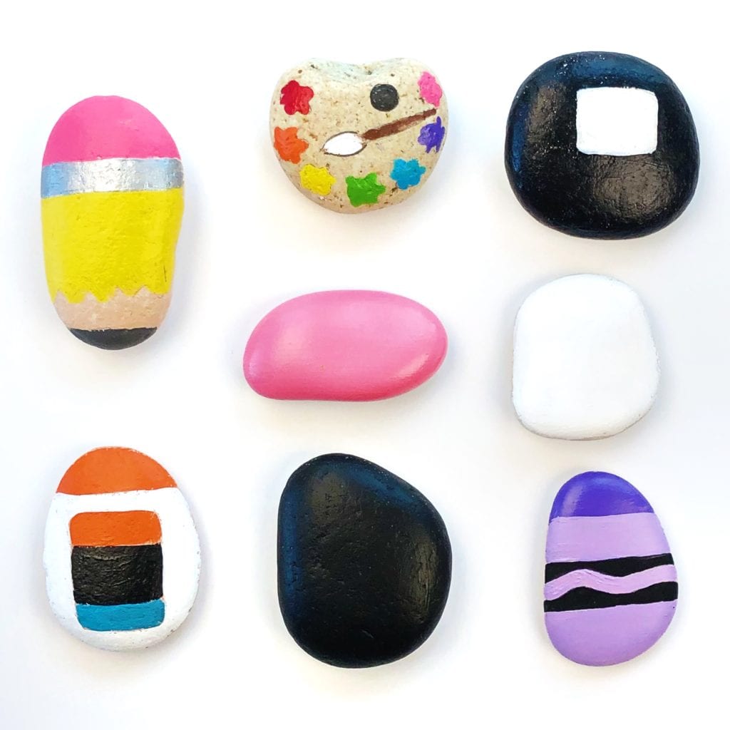 Adicionando as cores principais às nossas pedras pintadas de materiais escolares