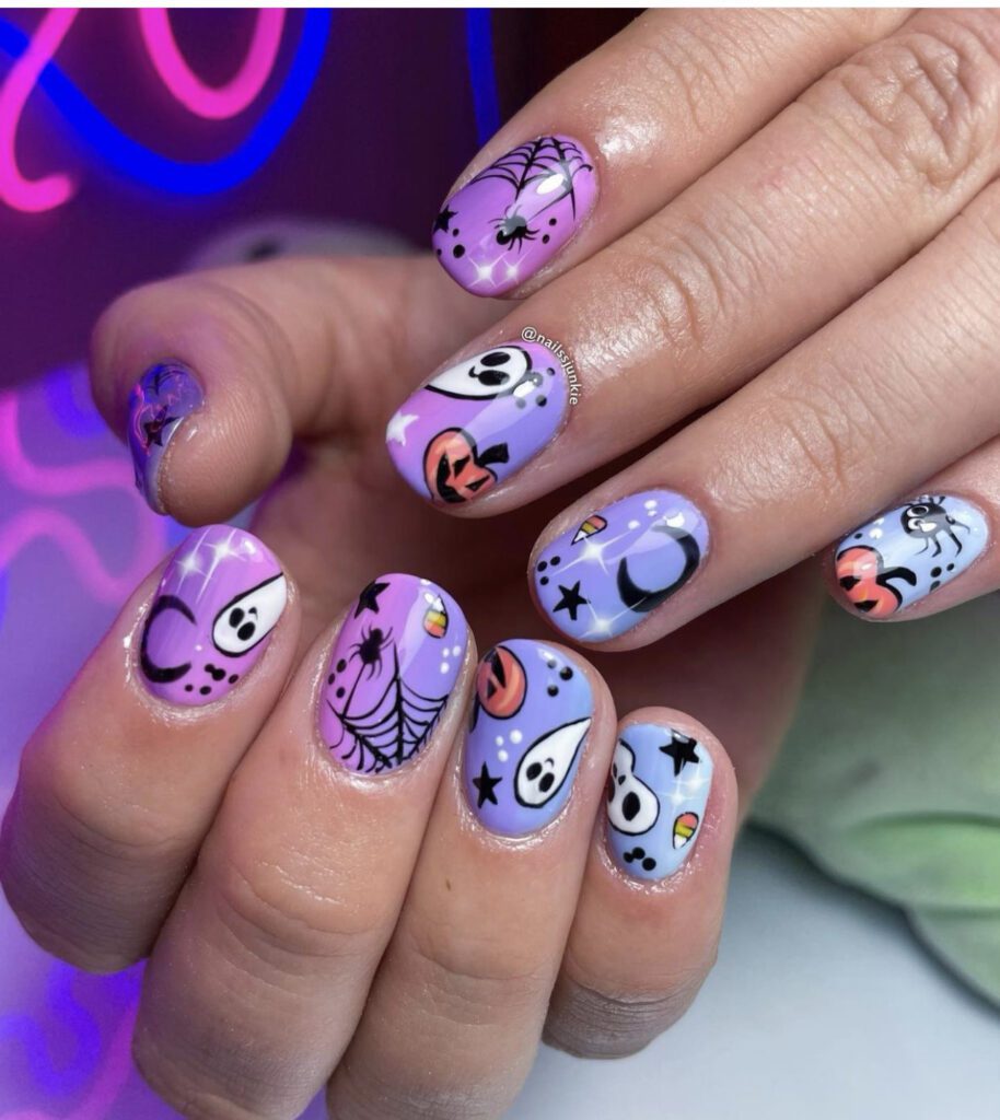 Unhas roxas com designs assustadores