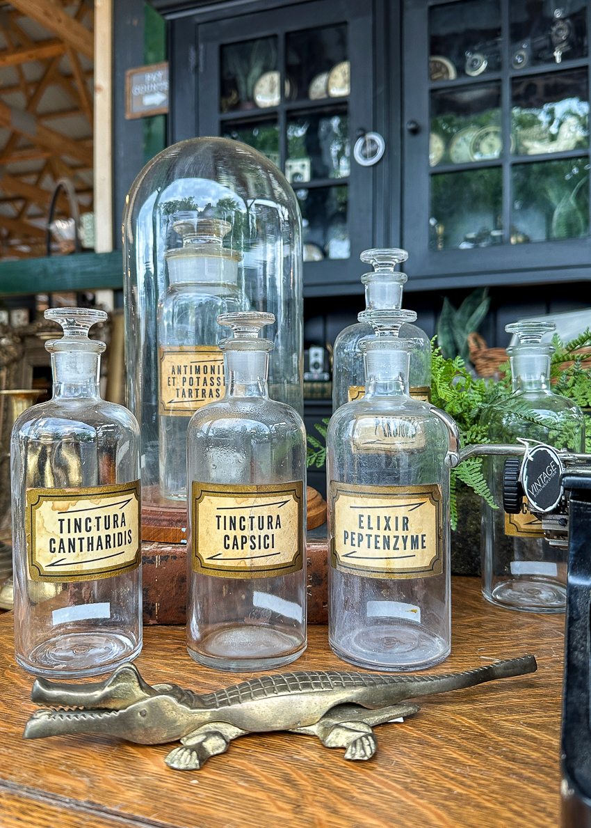 Explore my vintage booth from the Lucketts Spring Market. It's among the trendiest vintage markets on the East Coast! #vintage #vintagedecor vintage apothecary jars