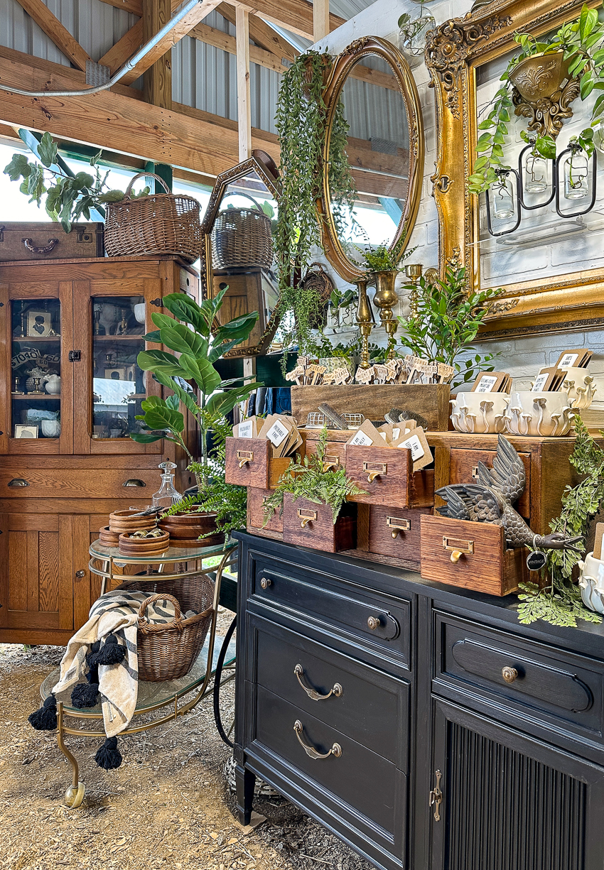 Explore my vintage booth from the Lucketts Spring Market. It's among the trendiest vintage markets on the East Coast! #vintage #vintagedecor card catalog, vintage propagation wall arrangement