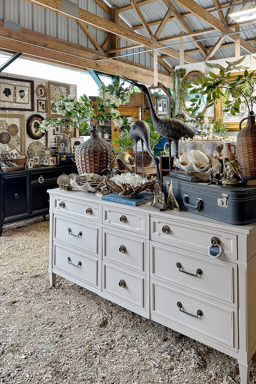 Explore my vintage booth from the Lucketts Spring Market. It's among the trendiest vintage markets on the East Coast! #vintage #vintagedecor lucketts spring market vintage arrangement