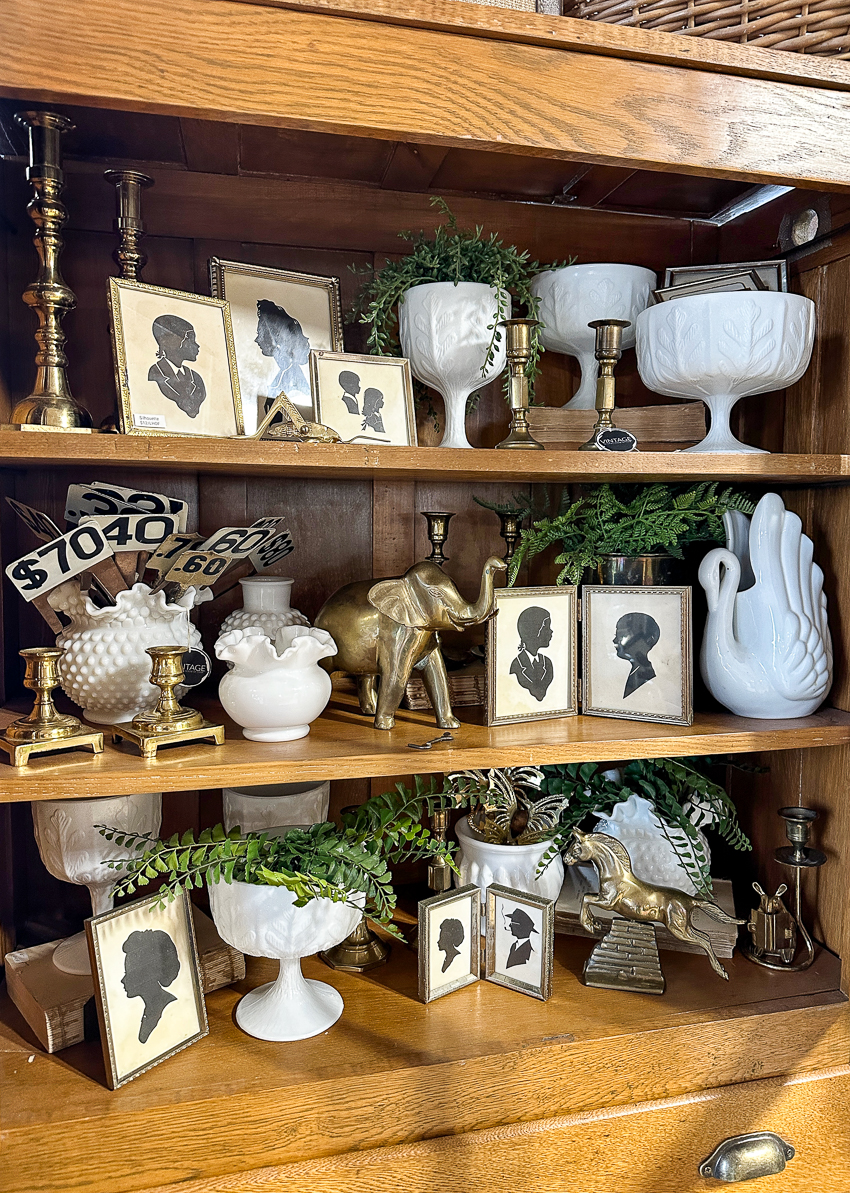 Explore my vintage booth from the Lucketts Spring Market. It's among the trendiest vintage markets on the East Coast! #vintage #vintagedecor glass milk vintage exhibition