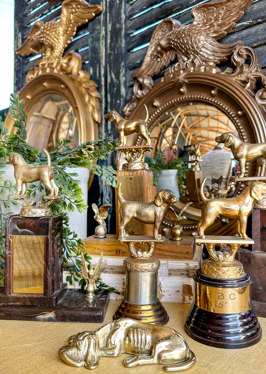 Explore my vintage booth from the Lucketts Spring Market. It's among the trendiest vintage markets on the East Coast! #vintage #vintagedecor set of vintage canine trophies