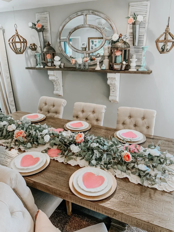 Mesa rústica com flores e pratos de Valentine